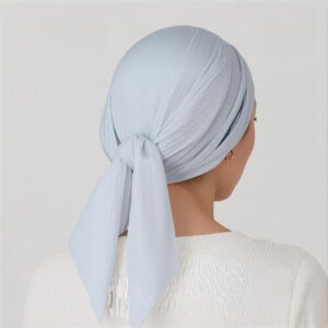 A chic, structured style where the fabric is wrapped and tied into a neat knot at the front. This style is both elegant and practical, giving a refined appearance.