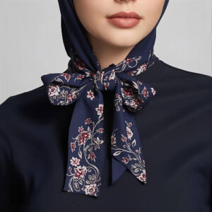 A playful, fashionable look featuring a floral-patterned scarf tied in a bow under the chin. This style gives off a feminine and youthful vibe, adding a touch of charm to any outfit.