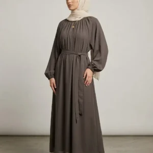 Coffee brown nida abaya side view showing pleated neckline and waist belt tie