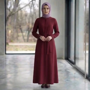 Deep maroon nida abaya with collar closure, waist belt, and relaxed A-line silhouette