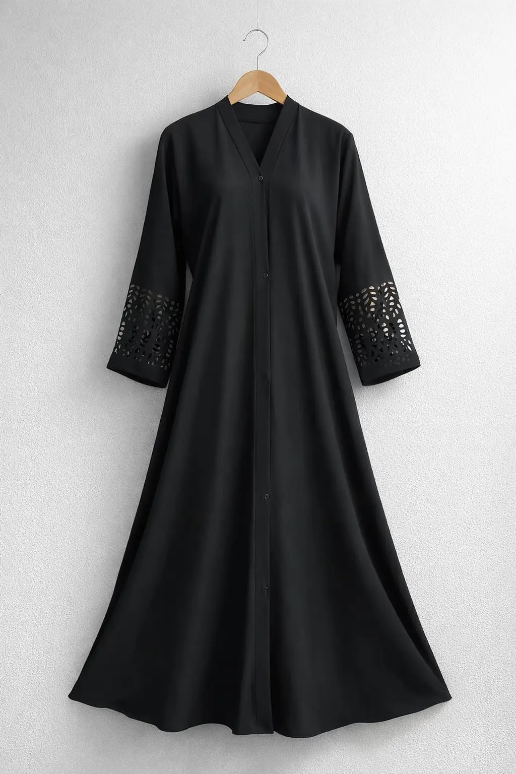 Black Georgette abaya hanging with front open design and laser-cut sleeve pattern by hoorhijabnabayas