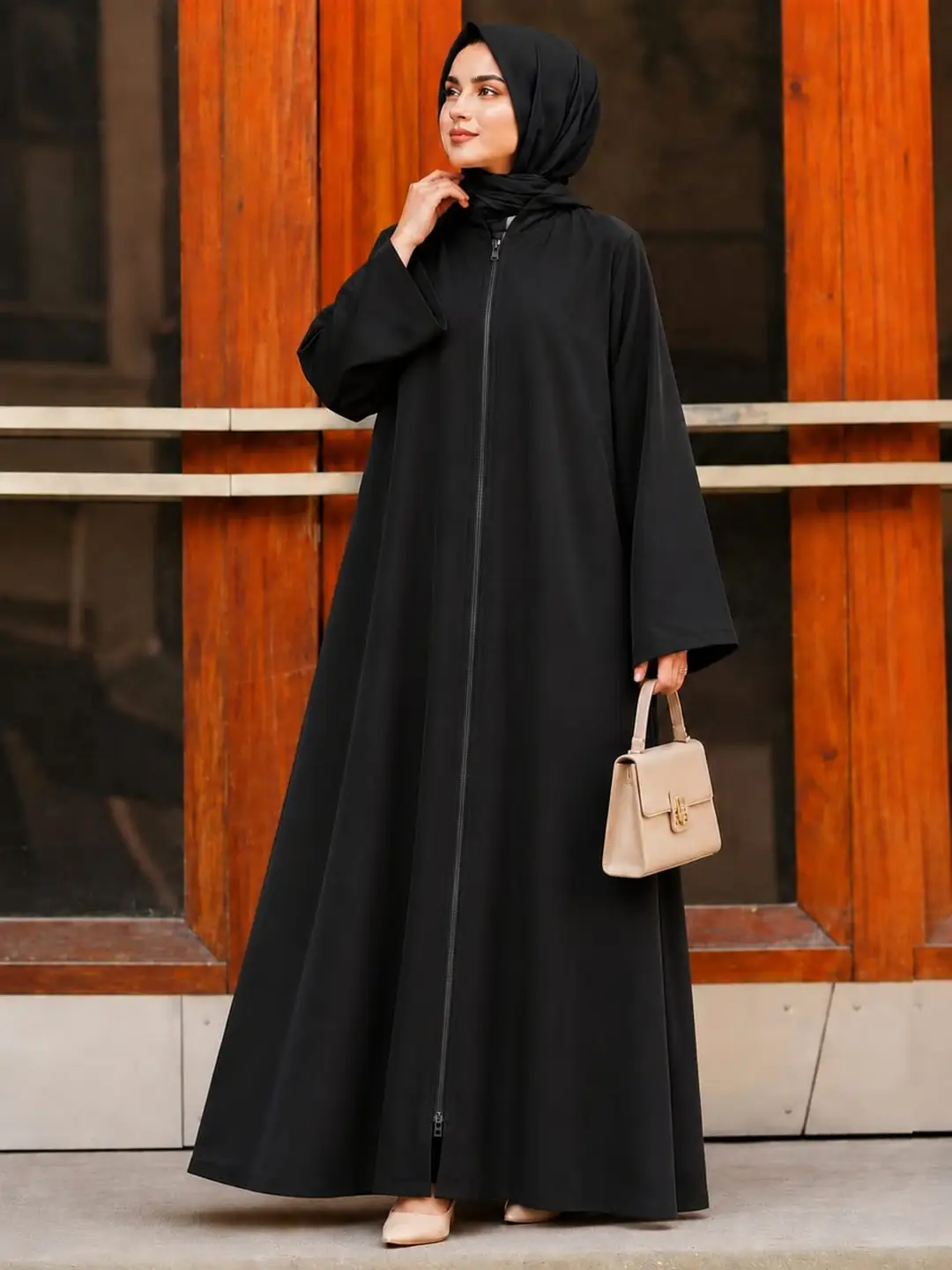 Premium black plain abaya for women with flowing full-length design and stylish handbag, modest fashion from hoorhijabnabayas